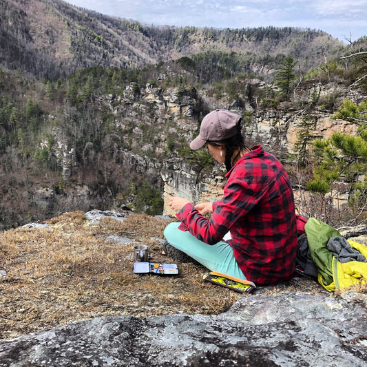 Watercolor painting en plein air in the Linville Gorge Wilderness, Blue Ridge Mountains, NC