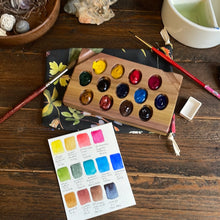 Load image into Gallery viewer, 13 Well Watercolor Palette with paint, rainbow poplar wood